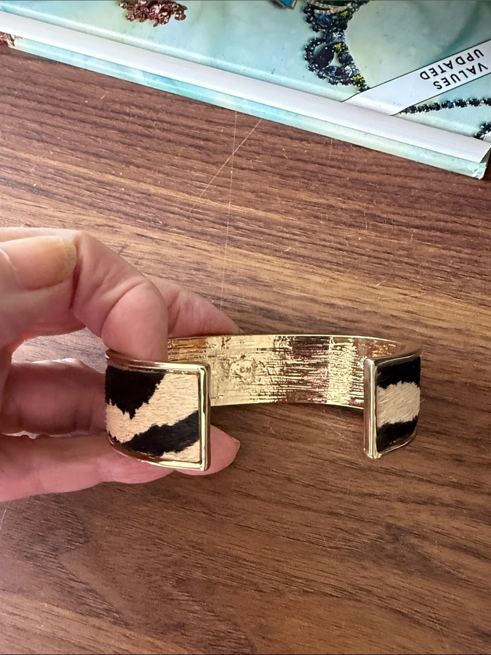 Bangle Bracelet w/Faux Zebra Printed Hide Set in a Gold Tone Elliptical Frame. - Picture 4 of 6